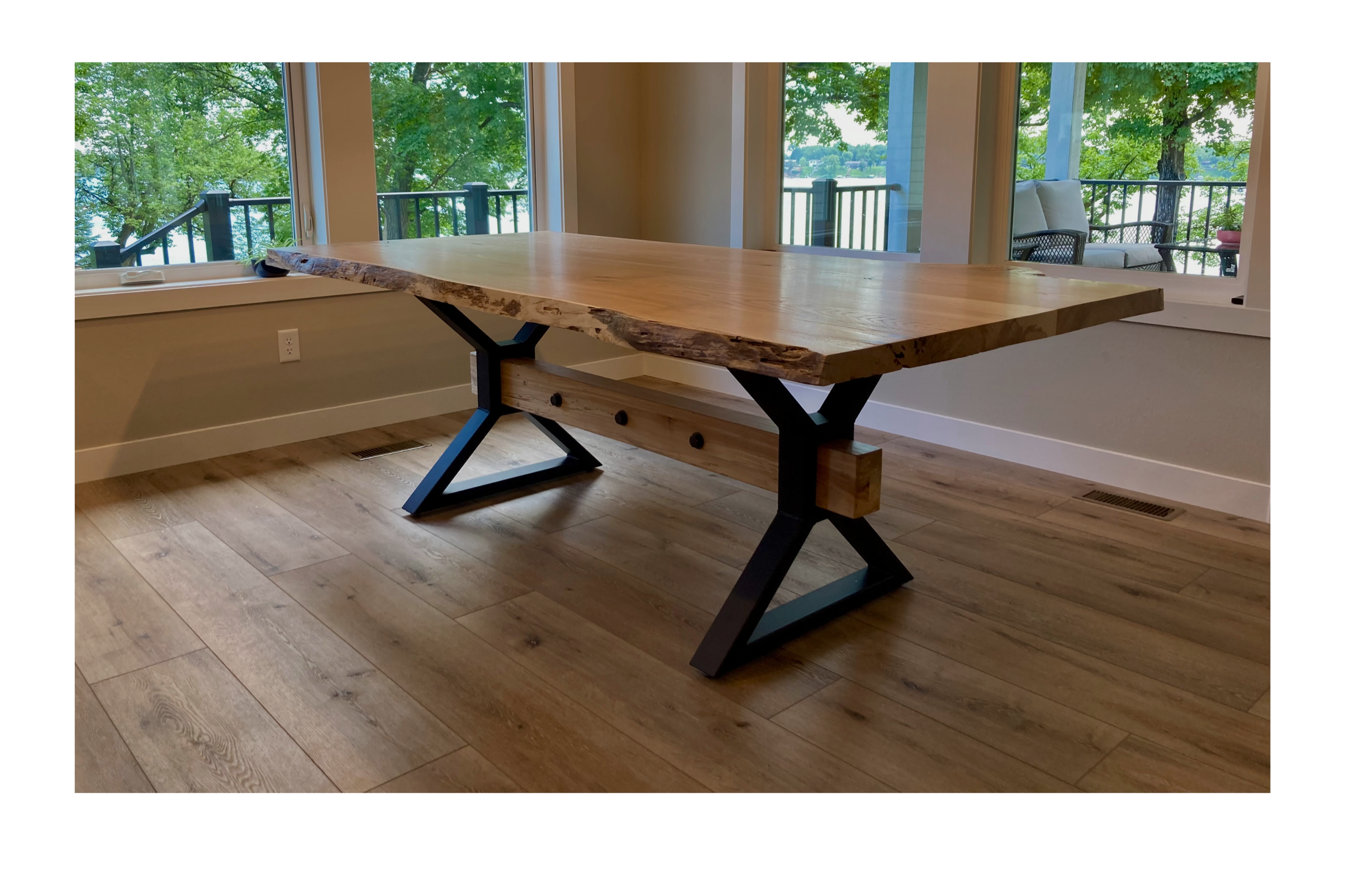 Handcrafted wooden table with metal legs